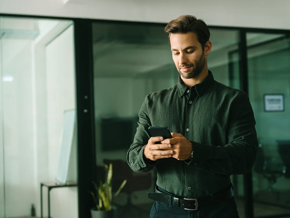 Professional checking his phone